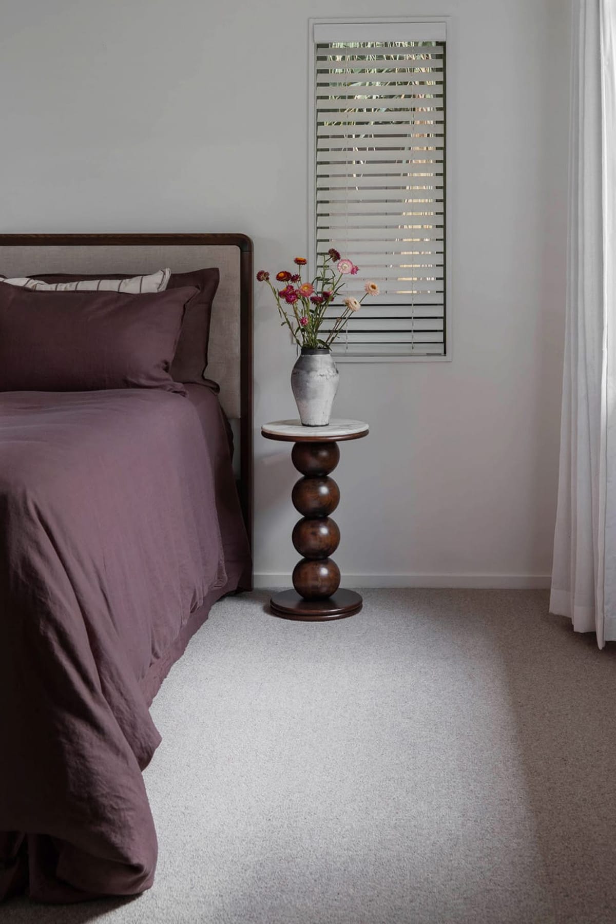 Minimal bedroom with Giulia Side Table and Bremworth Haru Collection carpet